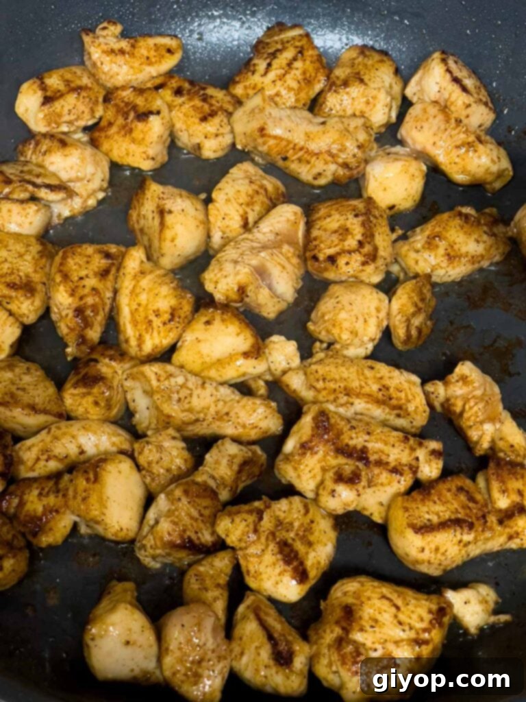 Zesty Louisiana Chicken Pasta 6 Perfectly browned and cooked cut up chicken breast in a skillet, ready for the sauce ingredients.