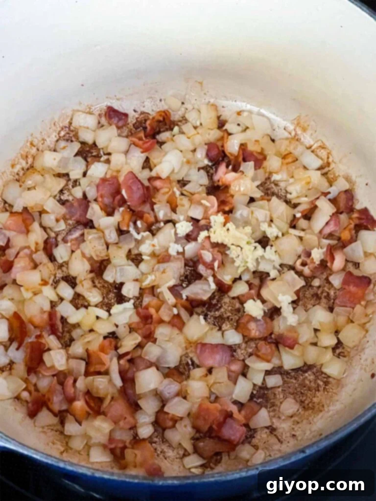Garlic added to the cooked bacon and onions for southern green beans and potatoes.